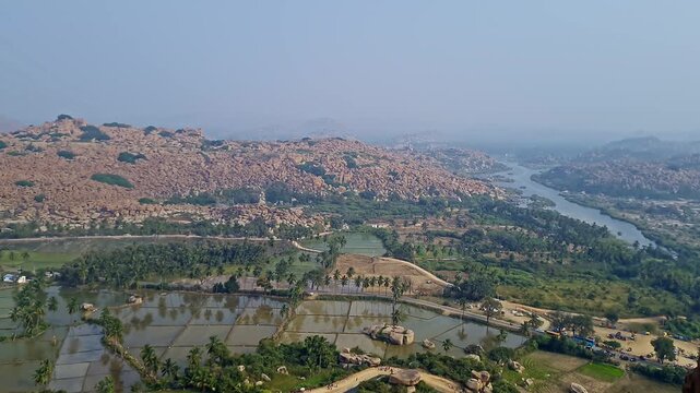 Wide view of sacred Anjanadri hill landscape in hampi karnataka surrounded by scenic nature