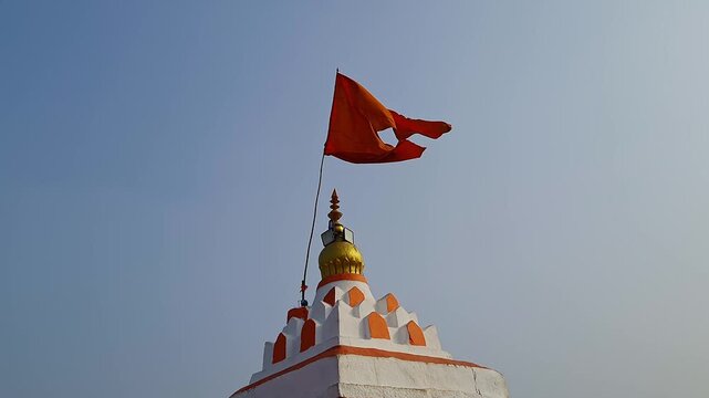 Sacred Red Flag Flying Above Anjanadri Temple Symbolizing Devotion and Spiritual Faith