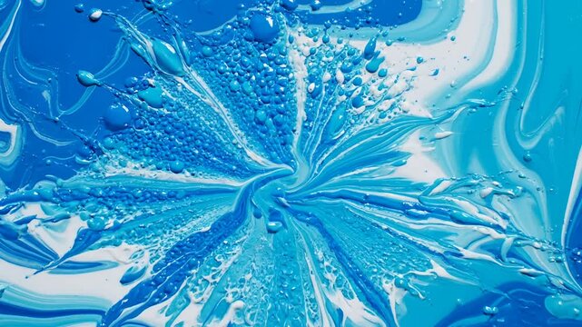 Abstract Blue and White Liquid Splash Explosion Macro Shot.