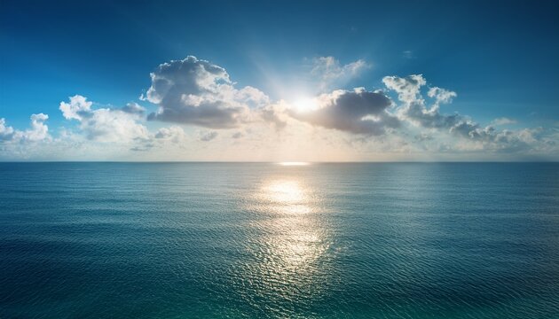 sunny ocean horizon wallpaper with glowing reflection and peaceful atmosphere high resolution picture