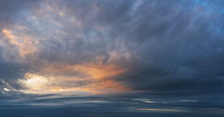Fototapeta premium Clouds at sunset on the sky.