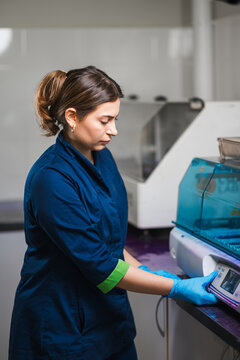 Female Laboratory Professional Manages Assay Review Process Ensuring Accuracy And Consistency