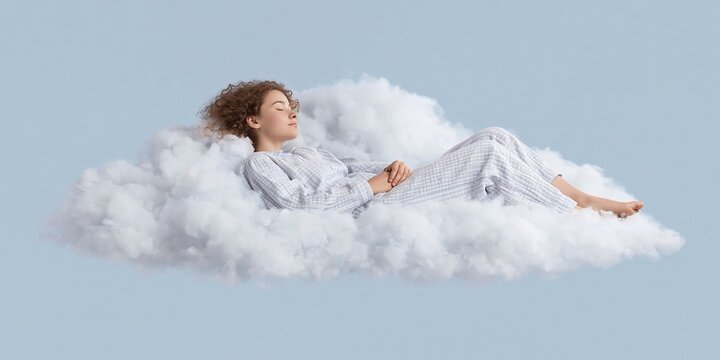 woman is sleeping on a cloud - naptime in a soft comfortable cloud in the sky
