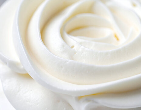 Hiasan krim frosting berbentuk pusaran dari dekat
