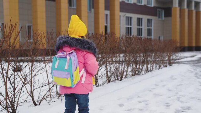Little Child Kid girl elementary school student, Child with school backpack, charming preschooler goes classes high school, Happy family, Girl daughter student with backpack hurries class, little