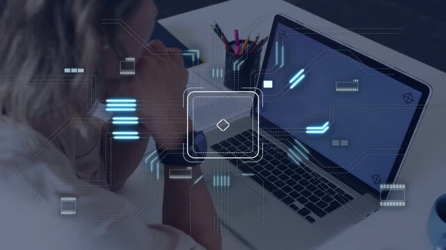 Woman resting chin watching laptop as trackpad square expanding into tech HUD, previewing prototype