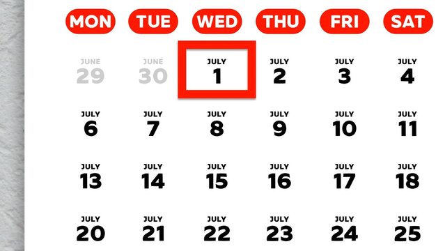 Close-up of July 1st date marked with a red cursor on a 2026 wall calendar
