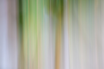 Fototapeta premium Abstract Vertical Motion Blur Background in Soft Green and Neutral Tones