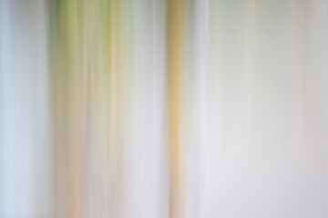 Fototapeta premium Abstract Vertical Motion Blur Background in Soft Green and Neutral Tones