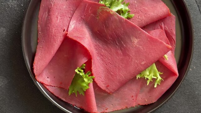 Beef ham thin slices of veal ham meat dish lunch or dinner tasty snack fresh gourmet food background on the table rustic food close-up copy space