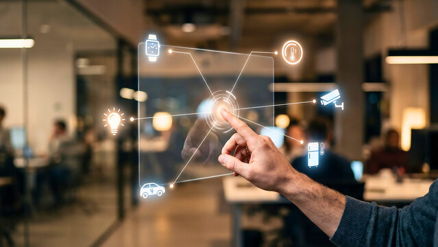 Hand touching virtual interface connecting smart home and IoT device icons, internet of things concept, smart home automation, connected technology, IoT network, digital transformation