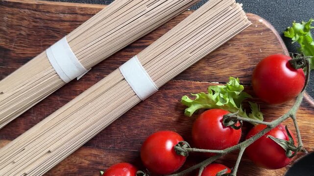 Buckwheat noodles soba raw pasta food preparation lunch or dinner tasty organic snack fresh gourmet food background on the table rustic food close-up copy space 