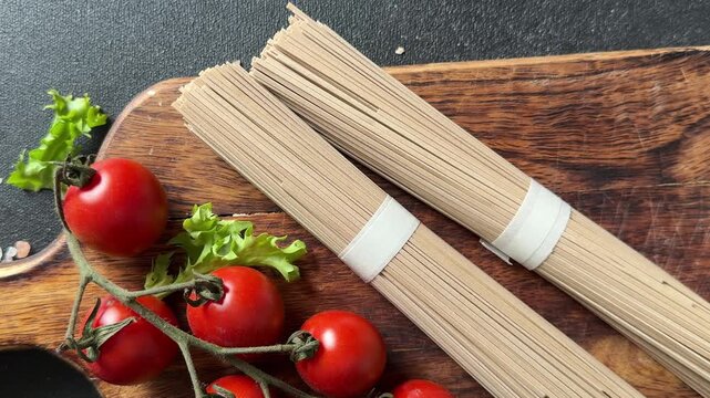 Buckwheat noodles soba raw pasta food preparation lunch or dinner tasty organic snack fresh gourmet food background on the table rustic food close-up copy space 