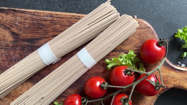 Buckwheat noodles soba raw pasta food preparation lunch or dinner tasty organic snack fresh gourmet food background on the table rustic food close-up copy space 