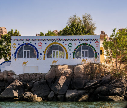 Colorful Nubian traditional house on the bank of the Nile. Aswan Egypt