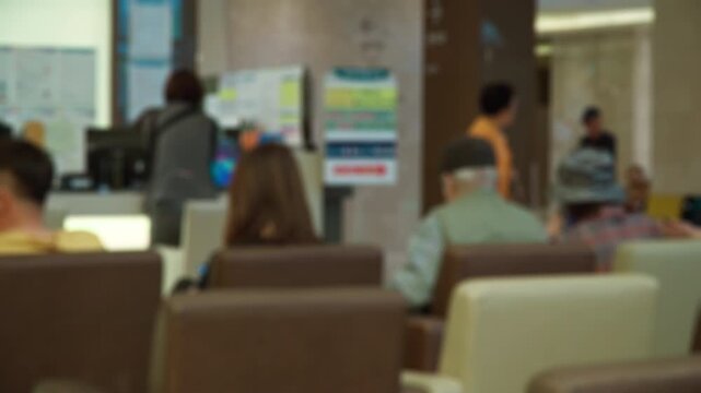 Defocused blurred video of the Busy Hospital Hallway Specialists Preparing for the Day Ahead in Hospital. Female and Male Physicians, Surgeons,