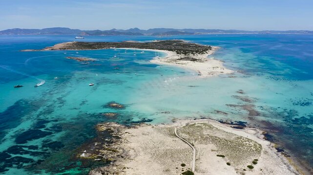 Drone view of famous islet of Espalmador and S&rsquo;Alga beach after Ses Illetes beach in the island of Formentera. Spain. 