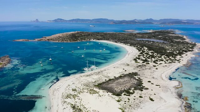 Drone view of famous islet of Espalmador and S&rsquo;Alga beach after Ses Illetes beach in the island of Formentera. Spain. 