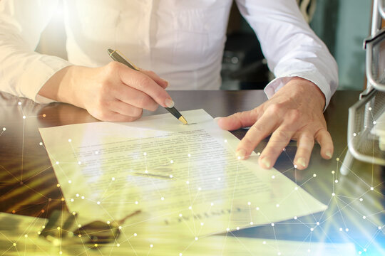 Woman signing a car purchase contract; multiple exposure