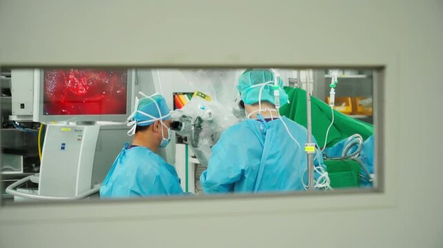 view through the window neurosurgeons performing high-precision brain surgery with advanced operating microscope, innovative surgical tools, hospital operating room,