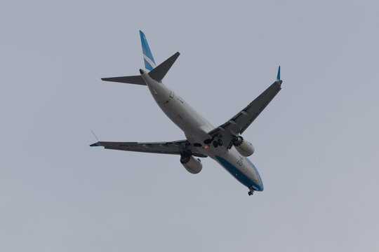 A Boeing 737 MAX 8 operated by Aerolineas Argentinas, flies over the city of C&oacute;rdoba, Argentina, on May 24, 2026.