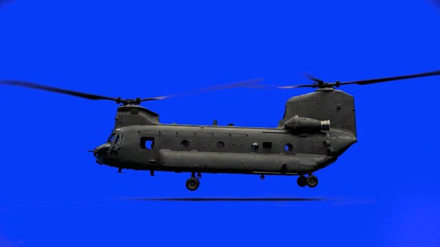 A heavy-lift military transport helicopter with a tandem twin rotor design flying forward. This realistic 3D cargo chopper animation is isolated on a blue chroma key screen for seamless cinematic edit