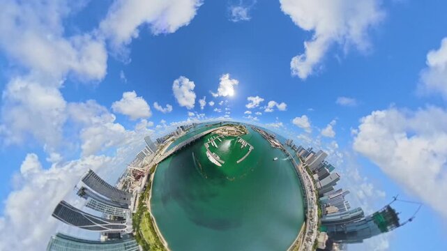 Aerial half tiny planet Downtown Miami Biscayne Bay by the city