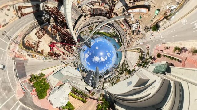 Inverted tiny planet aerial video Downtown Miami industrial scene