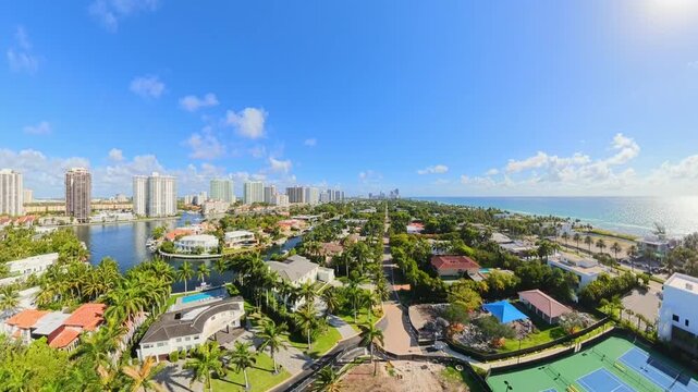 Aerial tour Golden Beach Florida a upscale luxury neighborhood 4k 60p