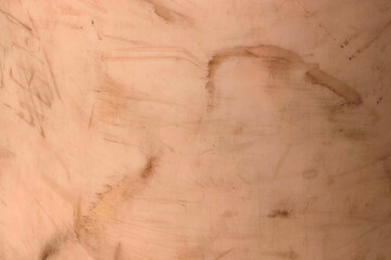 Rustic beige background with a scratched, textured surface and earthy tones © Rawpixel.com