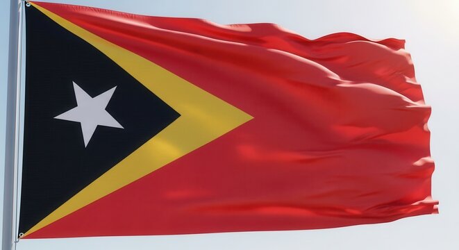 Timor Leste Flag Waving in the Wind Against Sky