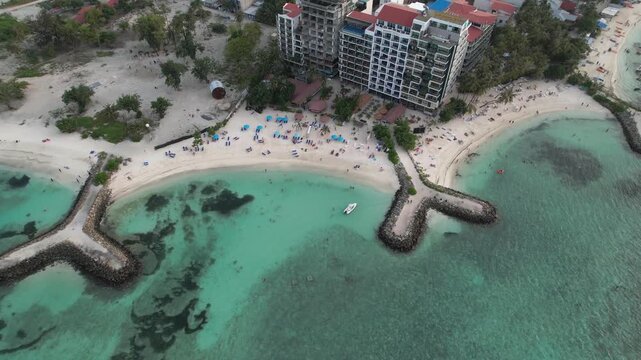 Aerial footage of Maafushi beaches in the Maldives atoll on a sunny day, 4k 30fps, 1 inch sensor drone