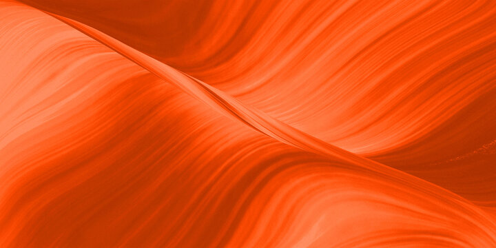 Abstract orange gradient background with a dynamic composition of diagonal lines that divide the image and create a texture that resembles an abstract sandstone canyon.
