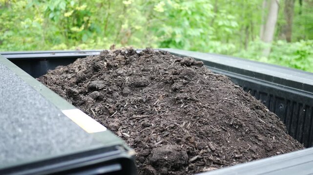 Clean Fill Dirt and Mushroom Compost in Truckbed for Gardening
