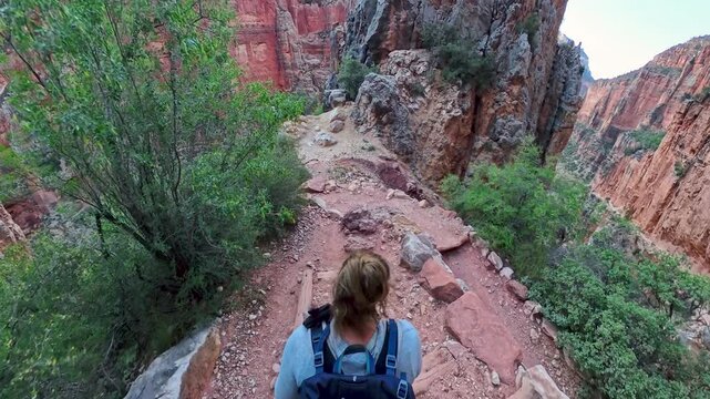 Woman Hikes Around Switchback on the North Kaibab Trail
