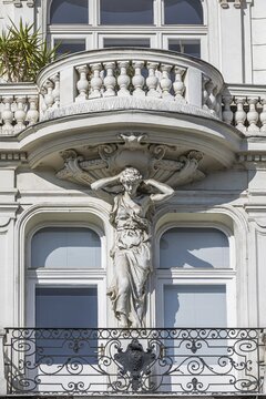 Baroque statue as support of a balcony on the left Wienzeile, Vienna, Austria