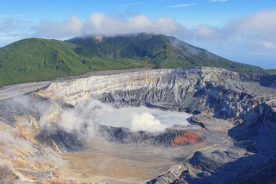 Caldera with crater lake, steam rising from Poas Volcano, Poas Volcano National Park, Costa Rica