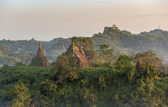 Mist over hills and stupas of Mrauk U at sunset, Burma, Myanmar