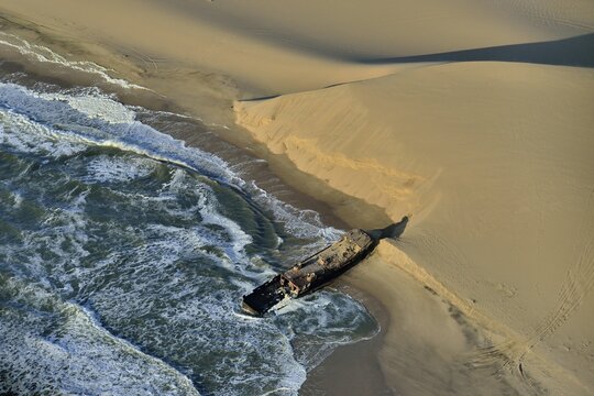 Wreck of the Shaunee, shipwrecked in 1976, Namibian coast near Conception Bay, south of Sandwich Harbour, aerial view, Namib-Naukluft National Park, Namibia
