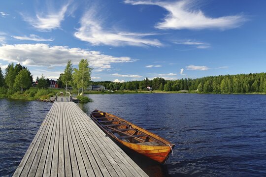 Lake with long jetty and wooden boat, Bathing, Summer, Nurmes, Kojonselk&auml;, Finland