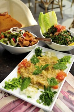 Baba Ganoush, eggplant or aubergine cream, Fattush, bread salad and tabouleh, parsley salad, Arabic mezze, appetizers in a Beirut restaurant, Beirut, Lebanon, Middle East, Asia