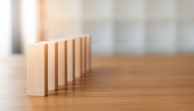 Brainstorming workspace wooden block domino row stop concept risk