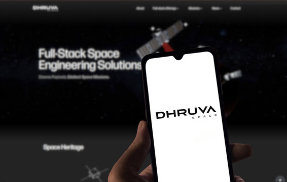 Dhruva Space logo on smartphone screen with company website in the background. Dhruva Space Private Limited is an Indian private aerospace manufacturer