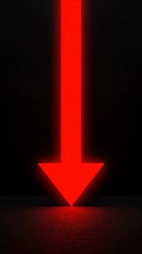 Red glowing arrow pointing down on black background