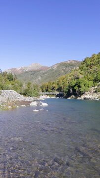 Parral, Maule Region - May 9, 2026: La Balsa sector, in the Parral mountain range, where the Longavi River flows through a valley surrounded by mountains and native forest.
