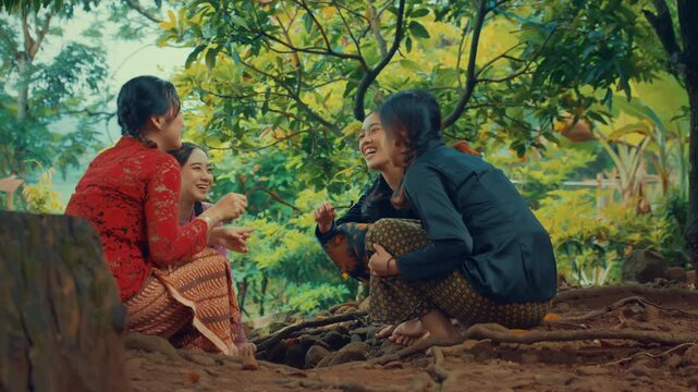 Indonesian Women Joking with Hand Gestures