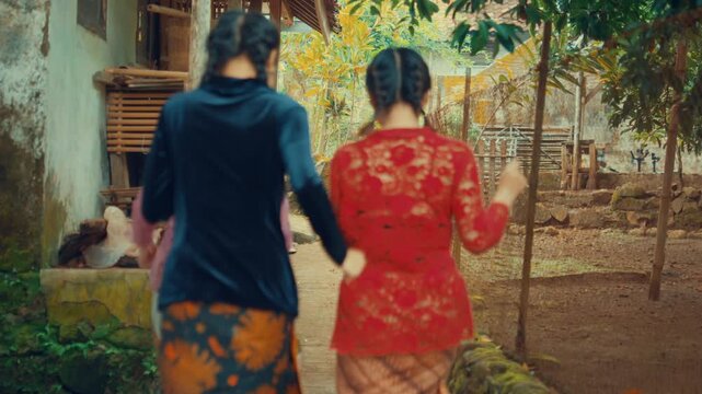 Colorful Traditional Kebayas Seen from Behind