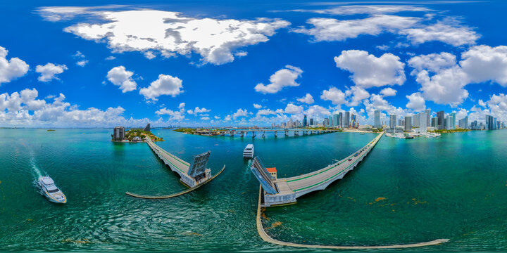 360 Aerial photo yachts passing under the Venetian Causeway Miami 2026