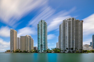 Fototapeta premium Long exposure photo Miami Brickell Key a residential island on the Miami River