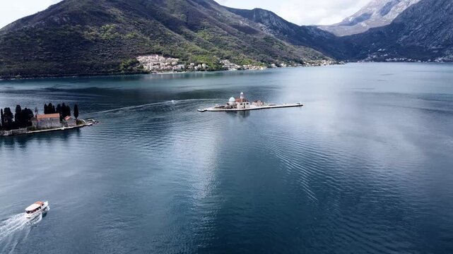 Drone view of the Church of Our Lady of the Rocks and Island of Saint George, Bay of Kotor near Perast.